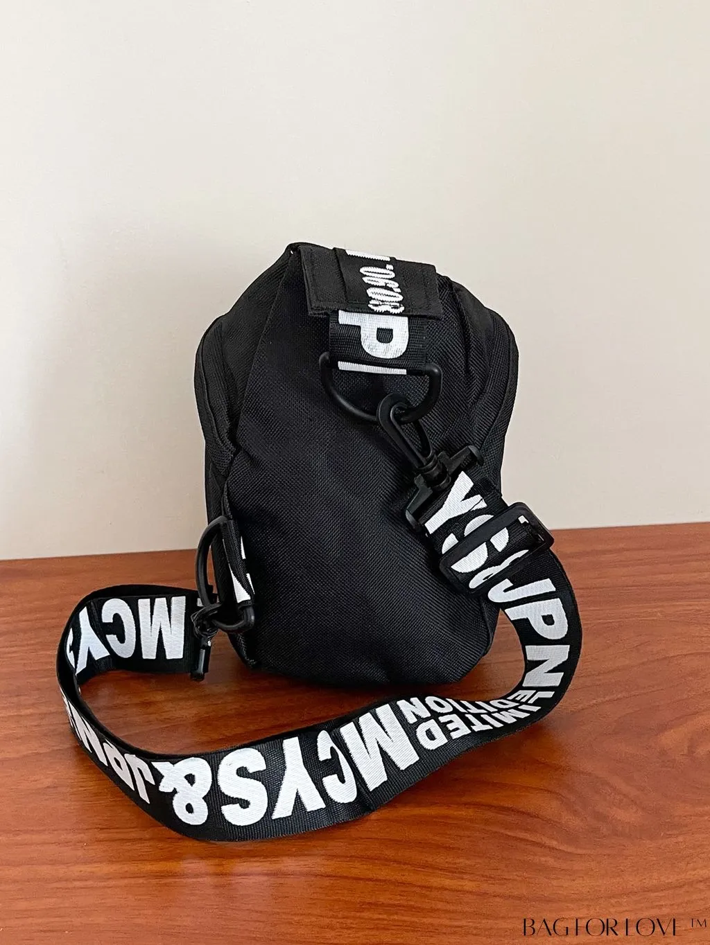 BagForLove - Compact Letter Graphic Sling Bag with Drawstring Closure