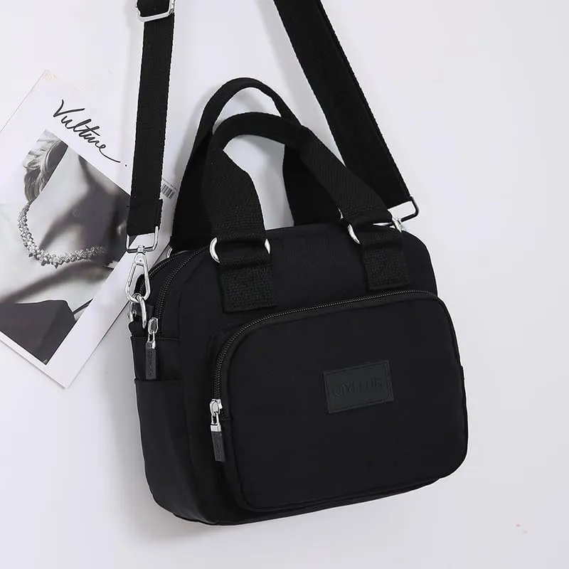 Middle aged women's multi pocket shoulder bag with large capacity crossbody bag (black)