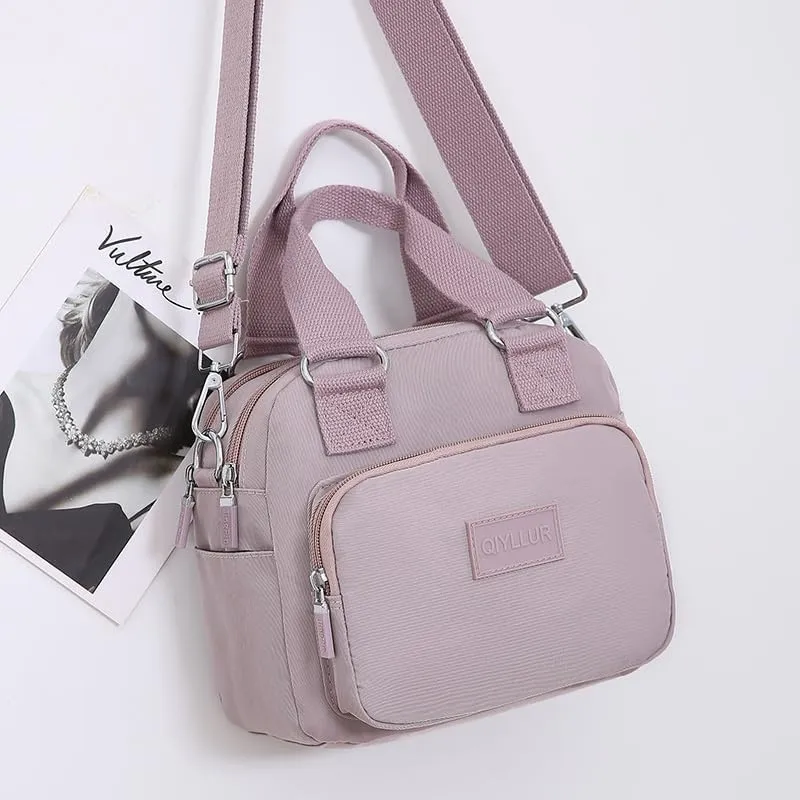 Middle aged women's multi pocket shoulder bag with large capacity crossbody bag (pink)