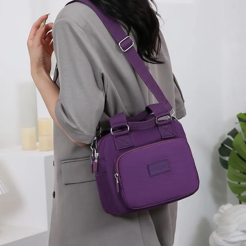 Middle aged women's multi pocket shoulder bag with large capacity crossbody bag (Purple)
