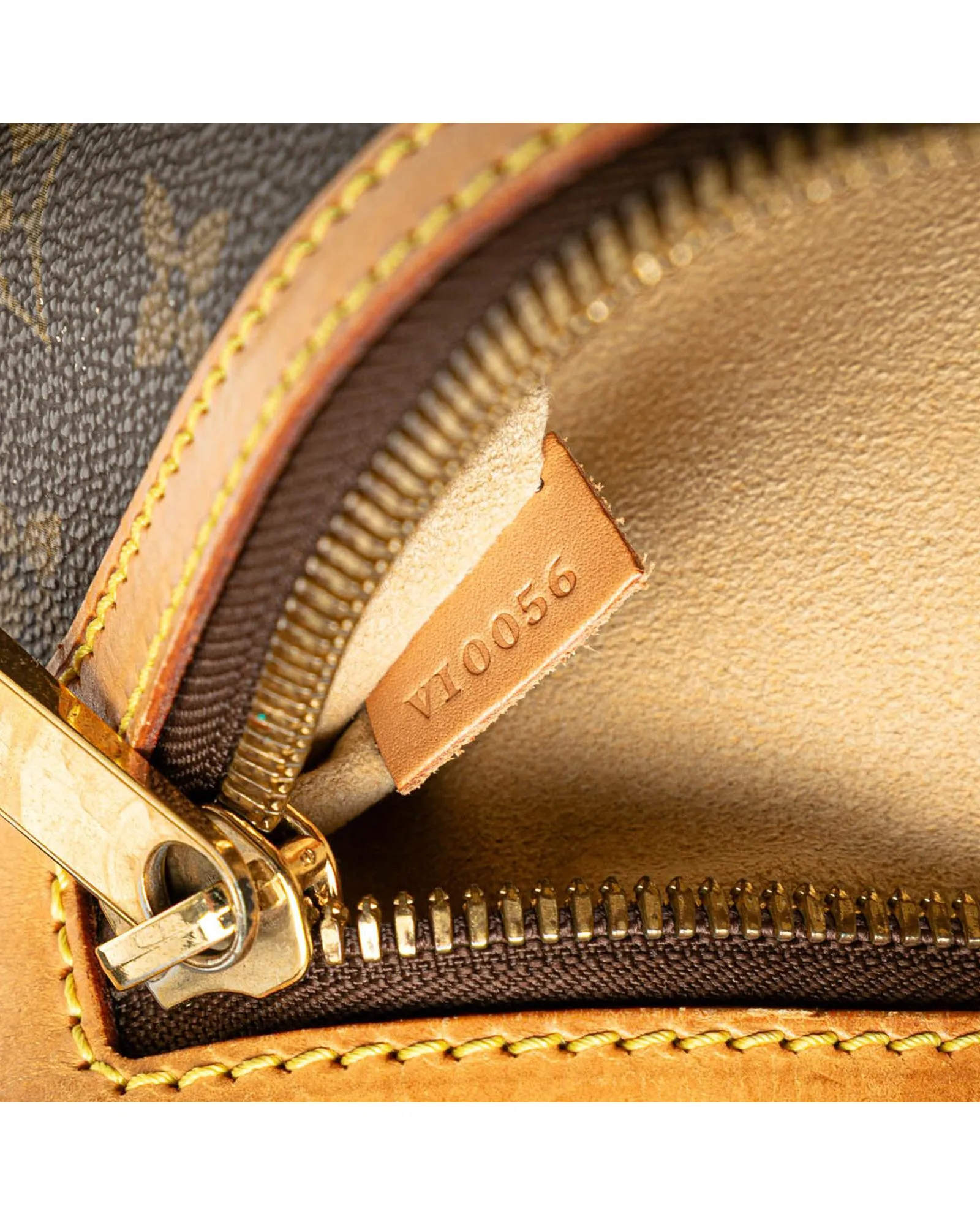 Monogram Canvas Bag with Leather Trim and Multiple Pockets