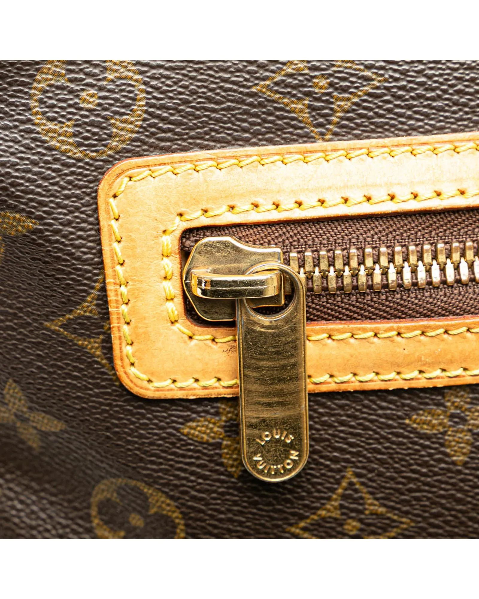 Monogram Canvas Bag with Leather Trim and Multiple Pockets