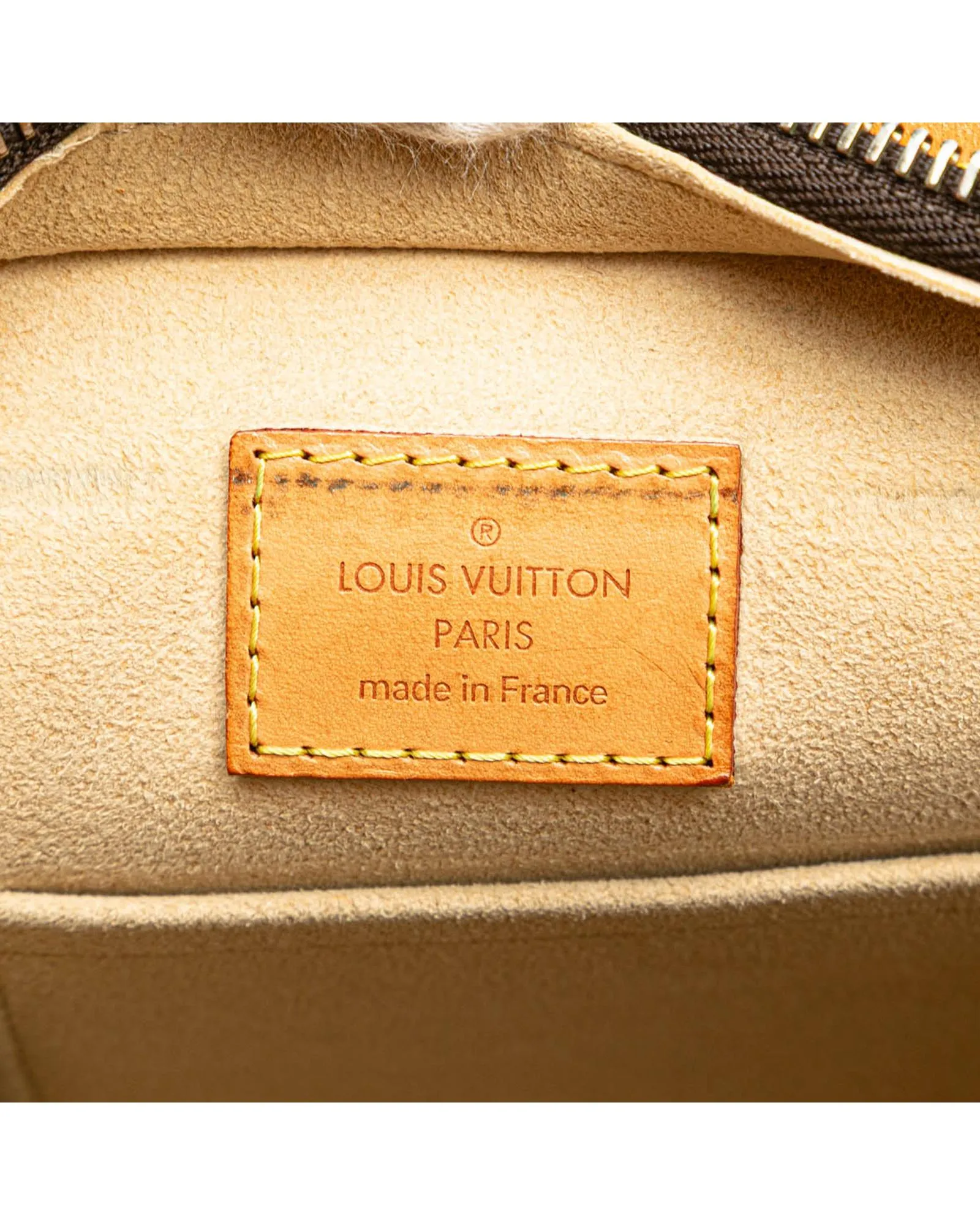 Monogram Canvas Bag with Leather Trim and Multiple Pockets